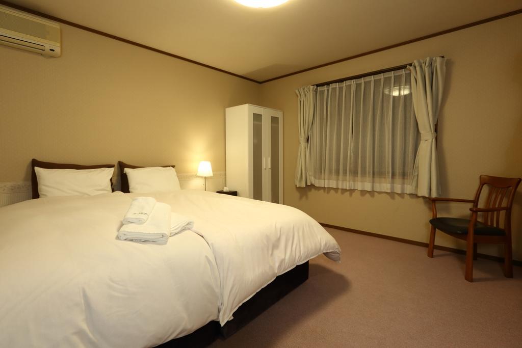 Snowlines Lodge Hakuba Rum bild